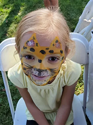 girl with cheetah face painting