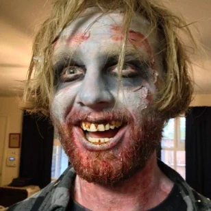 A an with a zombie facepainting