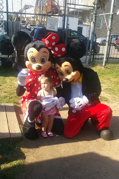 Mickey and Minnie Mouse costumes at kid's birthday party