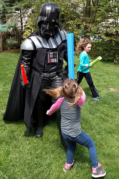 Darth Vader costume character at kid's birthday